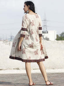 Beige Maroon Indigo Hand Block Printed Cotton Dress With Ajrakh Printed Border & Gathers - D73F428