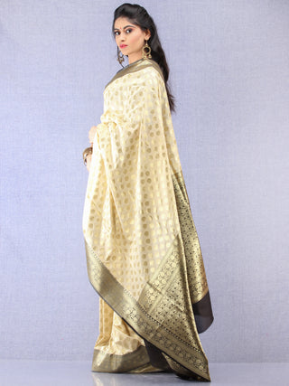 Banarasee Semi Silk Saree With Zari Border - Off White Black & Gold - S031704353