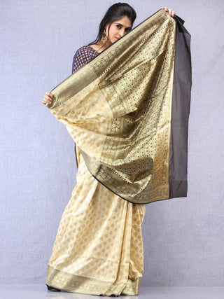 Banarasee Semi Silk Saree With Zari Border - Off White Black & Gold - S031704353