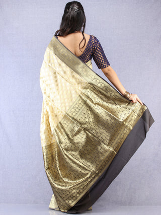 Banarasee Semi Silk Saree With Zari Border - Off White Black & Gold - S031704353